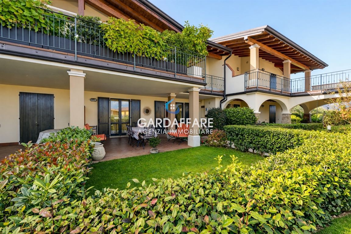 TRILOCALE AL PIANO TERRA IN SIGNORILE RESIDENCE A MANERBA DEL GARDA